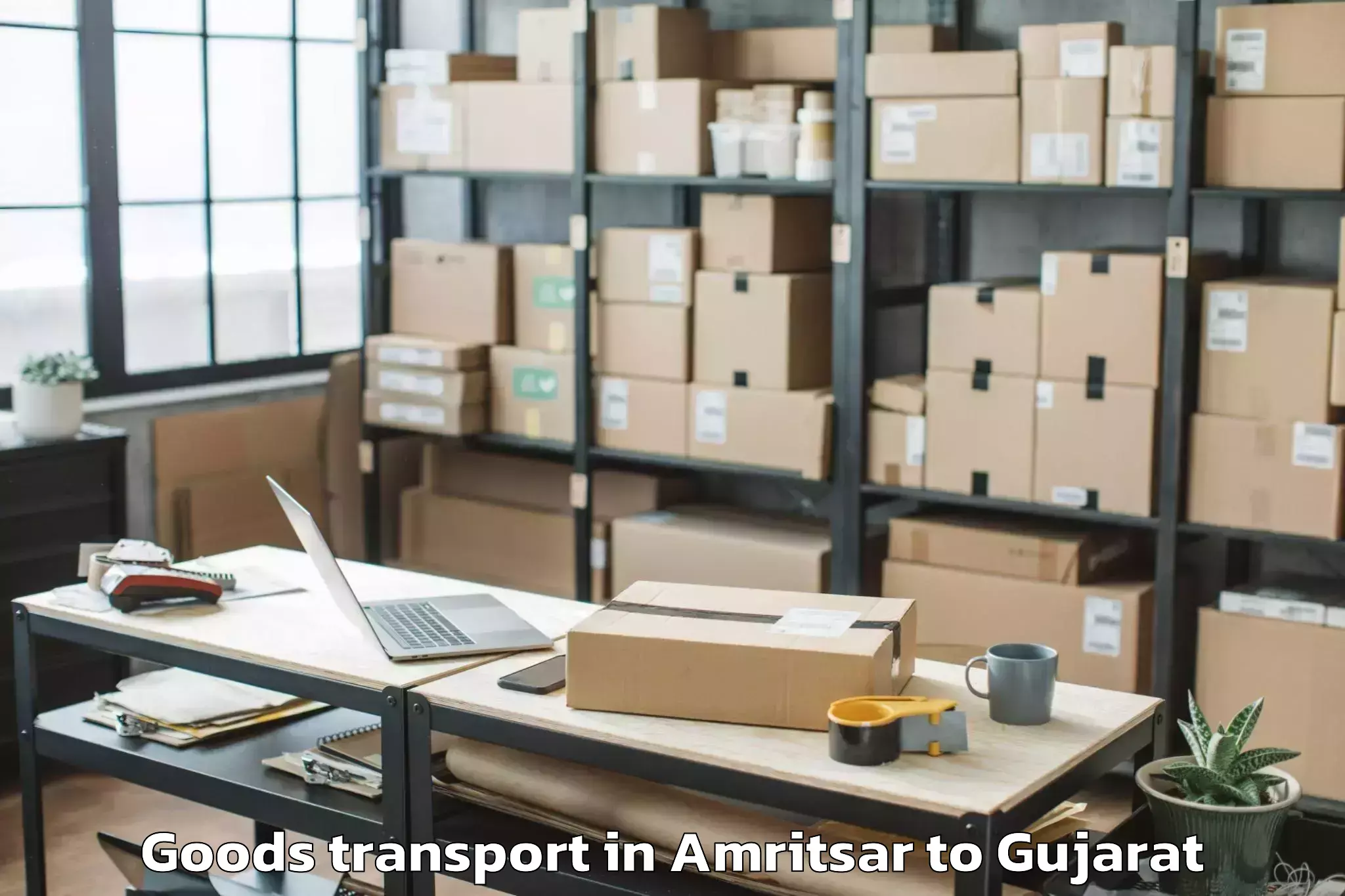 Top Amritsar to Gadhada Goods Transport Available